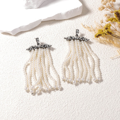 Elegantes pendientes de borlas con cascada de perlas de imitación