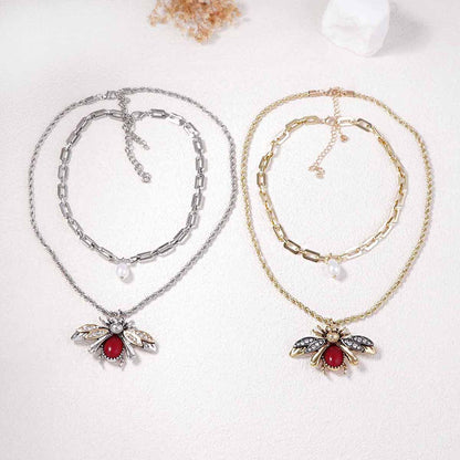 Collar con colgante de animal y perlas de imitación para mujer