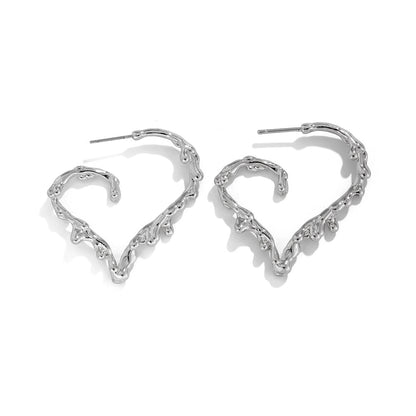 Pendientes asimétricos creativos con forma de corazón de lava