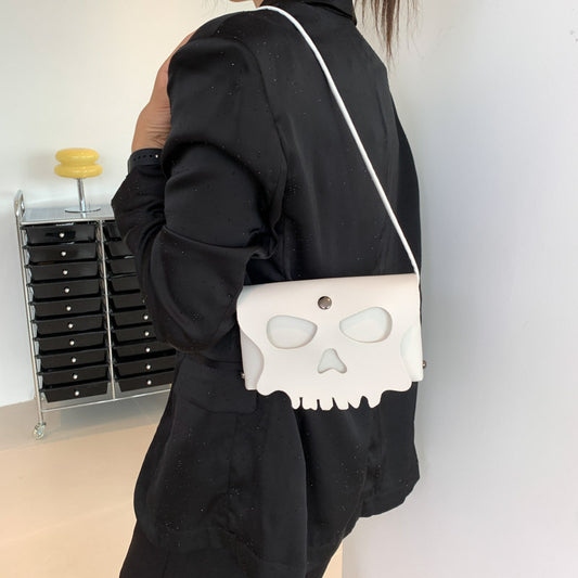 Bolso bandolera con calavera de color sólido y creativo de moda