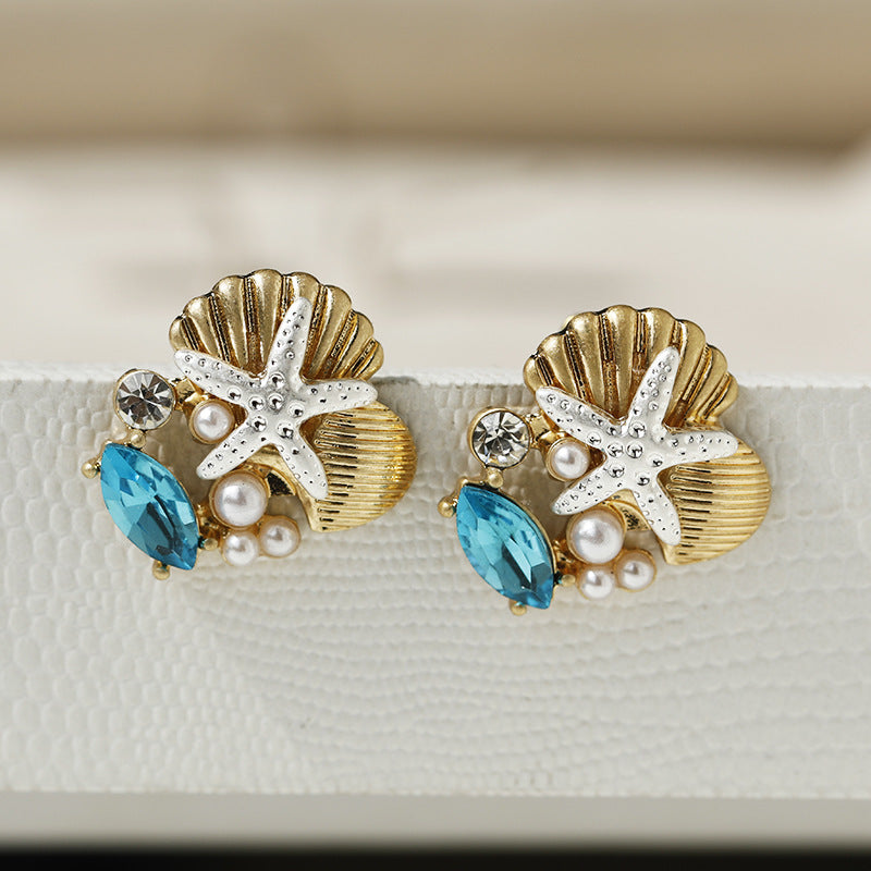 Pendientes de cristal con forma de estrella de mar, concha y perla para mujer, a la moda, para vacaciones, dorados y plateados.