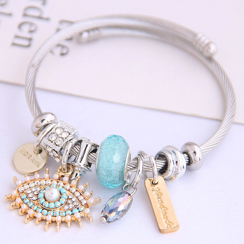 Pulsera de acero inoxidable con diseño vintage de mal de ojo para mujer