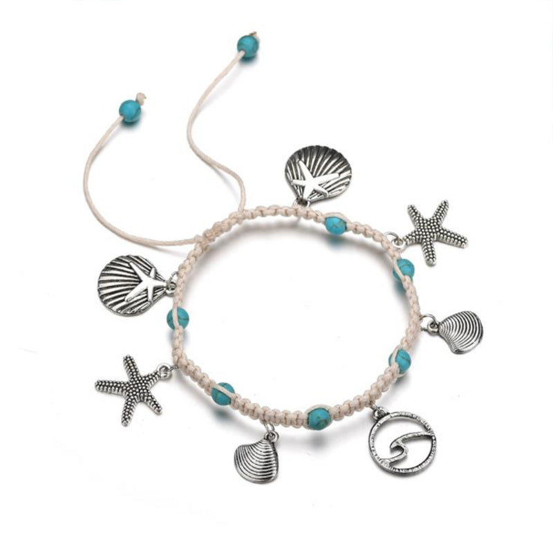 Tobillera bohemia de cuerda trenzada con conchas y estrellas de mar