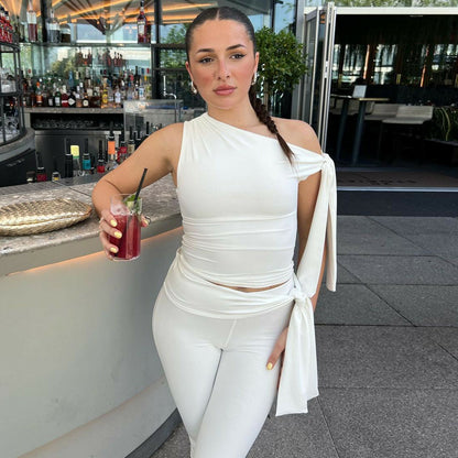 Conjunto de top y pantalones cortos sin mangas de color liso a la moda para mujer