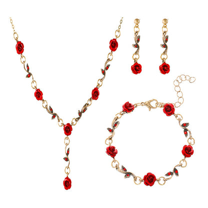 Conjunto de tres piezas de joyería floral con rosas vintage