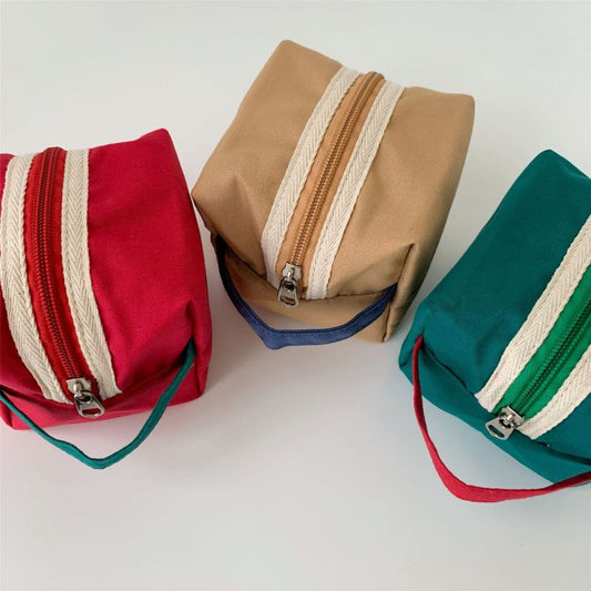 Bolsa de cosméticos pequeña de lona cuadrada con colores en contraste
