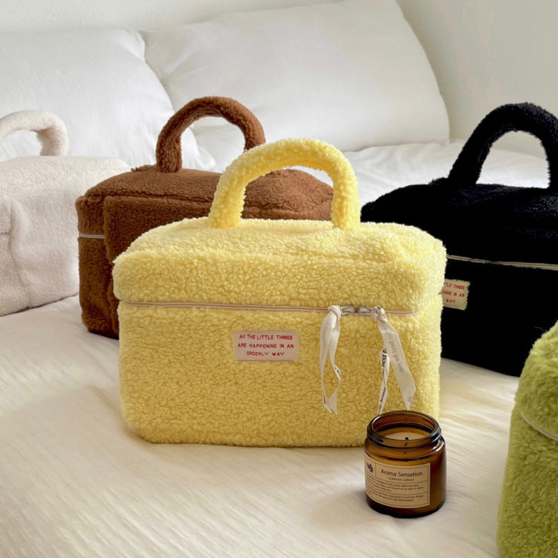 Bolsa de cosméticos de felpa con cremallera de moda para mujer