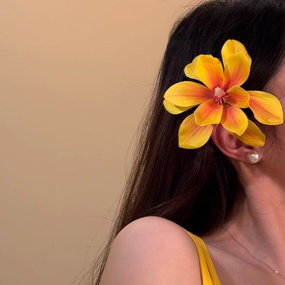 Horquilla floral amarilla para vacaciones en la playa