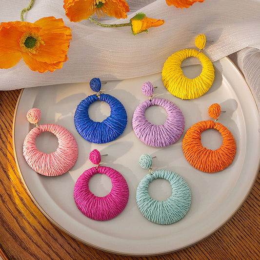 Boucles d'oreilles rondes creuses tissées de style bohème pour les fêtes