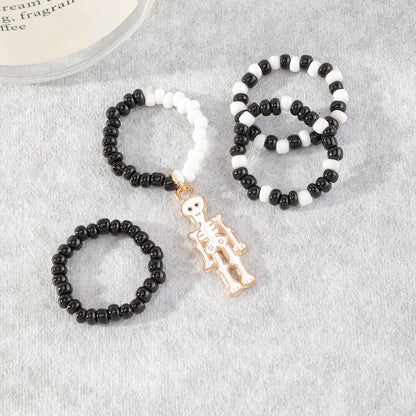 Anillos midi de calavera con cuentas blancas y negras para Halloween para mujer