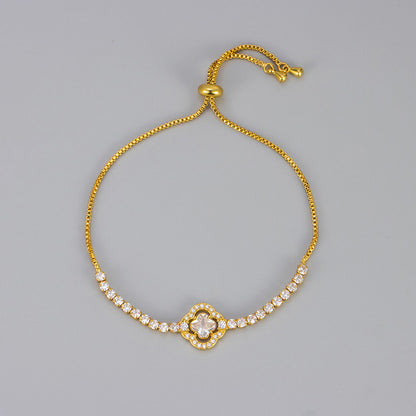 Pulsera de cobre con circonitas y flores de cuatro hojas para mujer