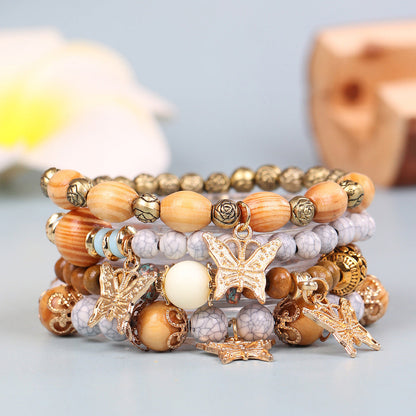 Pulsera multicapa con mariposas y cuentas estilo bohemio vintage