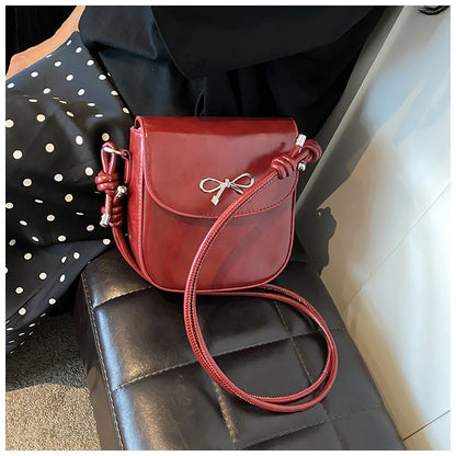 Mini bolso bandolera con lazo de color liso a la moda