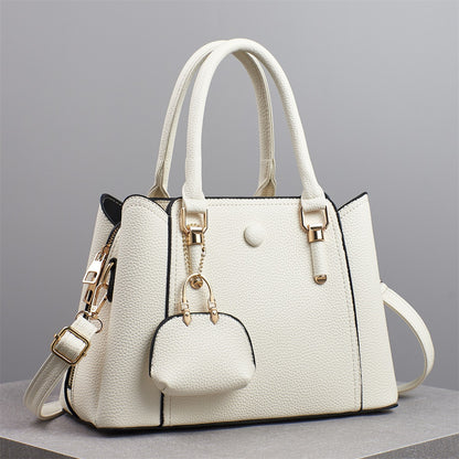Bolso de mano informal de gran capacidad y color liso para mujer, con cierre de cremallera.
