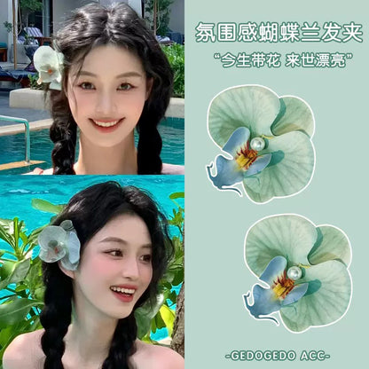 Accesorios florales para el cabello con mariposas para la playa