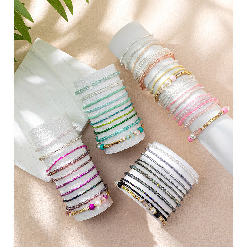 Conjunto de pulseras elásticas de cuentas de arroz multicolor bohemias