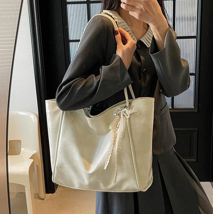 Bolso tote retro de piel encerada con aceite para mujer con colgante de lazo