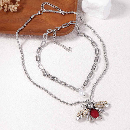 Collar con colgante de animal y perlas de imitación para mujer