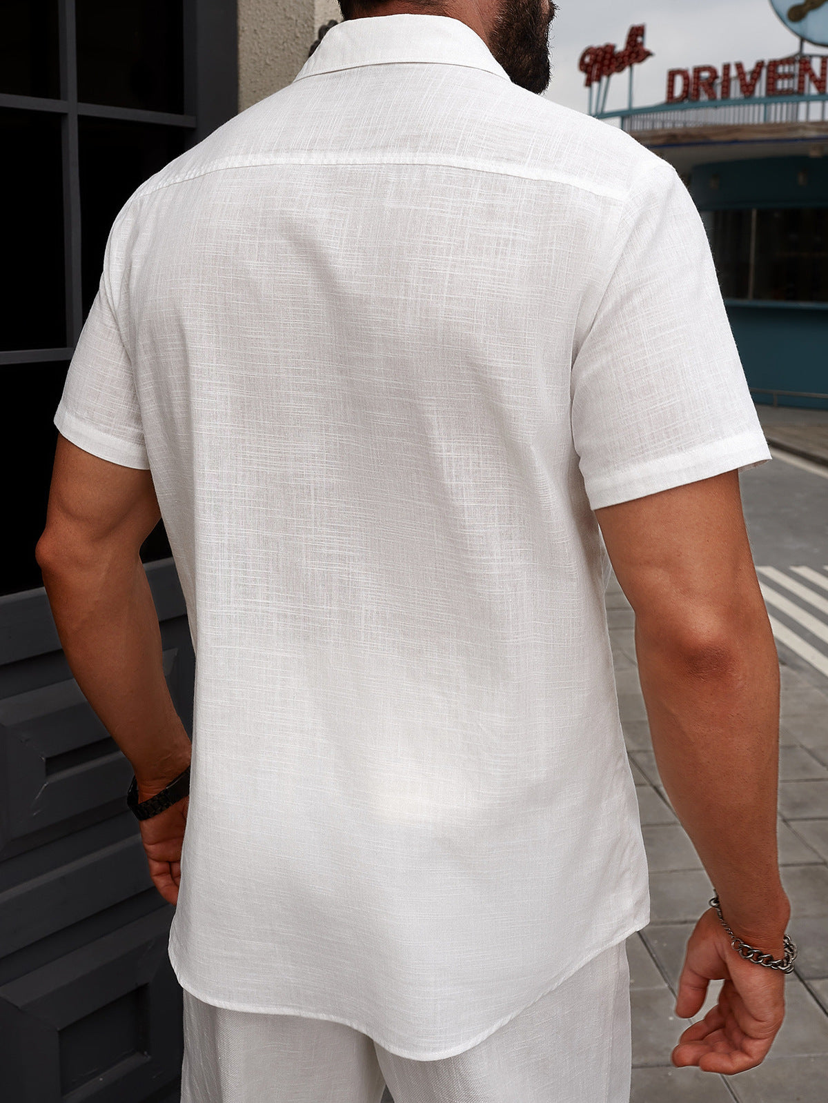 Camisa transpirable de manga corta de algodón blanco con solapa para hombre