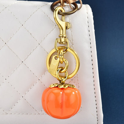 Llavero con colgante de bolsa de caqui de moda - Decoración metálica estilo fruta