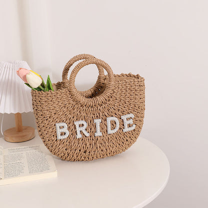 Bolso de mano de paja semicircular con letras de estilo bohemio
