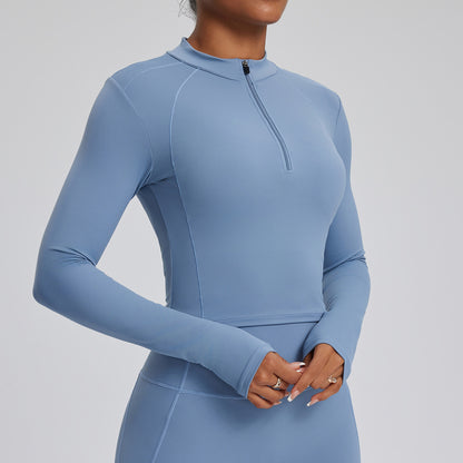 Top de yoga de manga larga de color liso para mujer, con cremallera y tejido de secado rápido