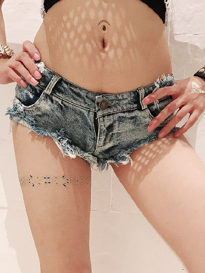 Shorts vaqueros de tiro bajo con agujeros para mujer