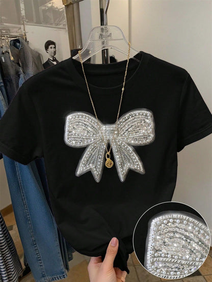 Camiseta informal holgada de cuello redondo con estampado de lazo para mujer de verano