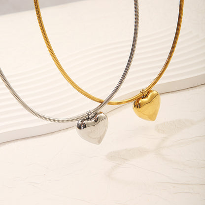 Collar circular sencillo de acero y titanio con forma de corazón de 18 quilates para mujer