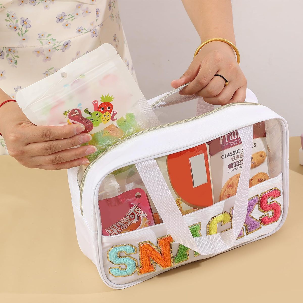 Bolsa de cosméticos transparente de PVC con letras bordadas