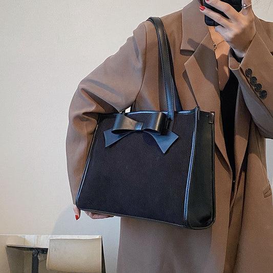 Bolso de mano de verano para mujer, de color liso y moderno.