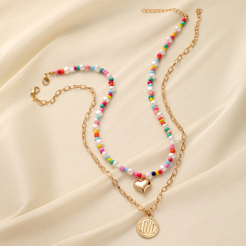 Collar bohemio de doble capa con monedas de amor para mujer