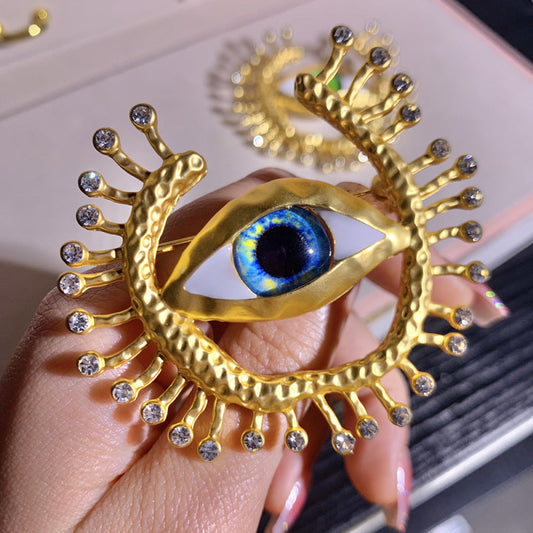 Broche rétro exagérée œil du diable pour femme