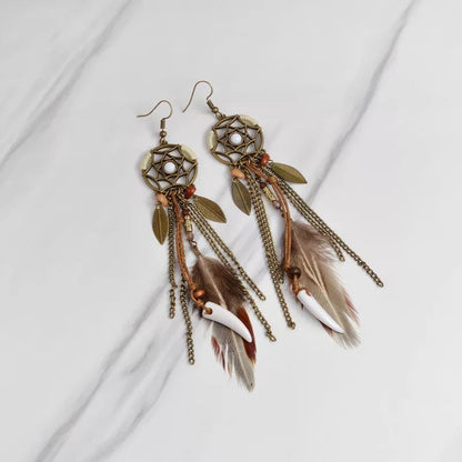 Pendientes bohemios hechos a mano con borlas de plumas huecas