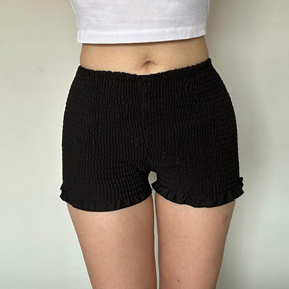 Pantalones cortos plisados ​​de color sólido sexys de moda para mujer