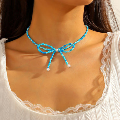 Collar bohemio con cuentas de arroz y lazo para mujer