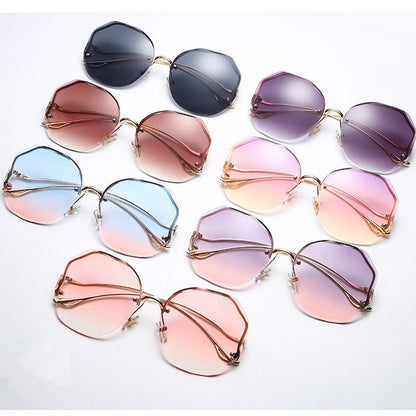 Gafas de sol sin marco con borde de arco metálico poligonal de moda