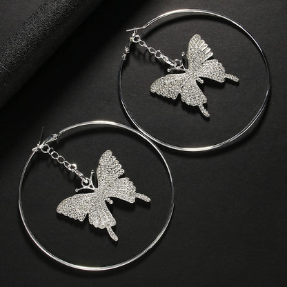 Boucles d'oreilles créoles papillon en strass à la mode exagérée