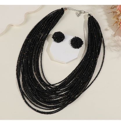 Conjunto de collar y pendientes con cuentas de arroz multicapa estilo bohemio para mujer