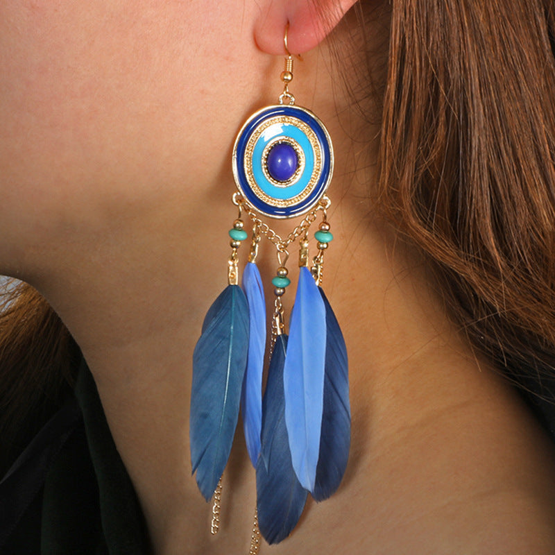 Pendientes bohemios con borlas de plumas exageradas