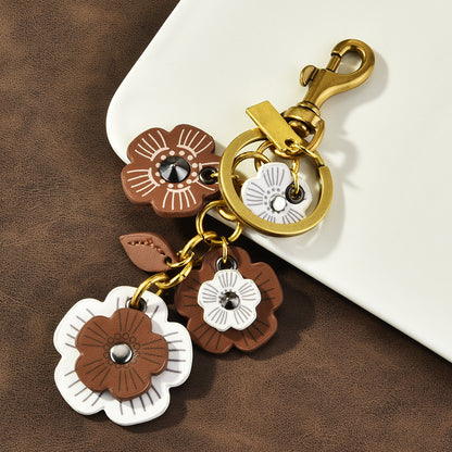 Llavero con colgante de cadena de flores retro para mujer - Material de PU de moda