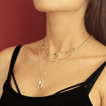 Collar con llave de corazón y cuentas multicolores bohemias
