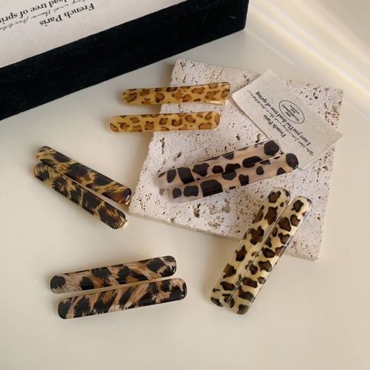 Épingle à cheveux longue en acrylique motif léopard pour femme - Accessoire de coiffure élégant et stylé