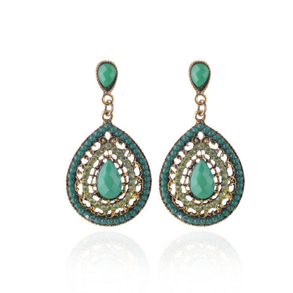 Pendientes colgantes con piedras preciosas huecas de estilo bohemio para mujer