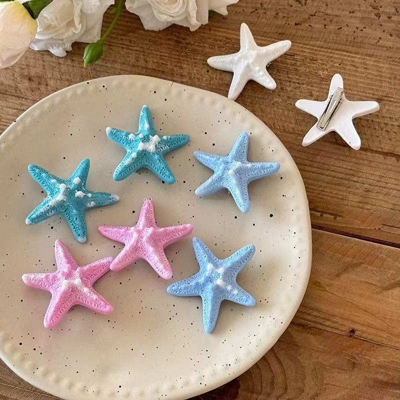 Accesorios para el cabello para vacaciones de verano junto al mar con estrellas de mar