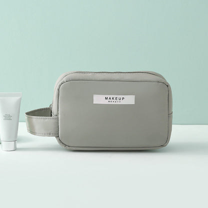 Bolsa de cosméticos portátil de viaje de color sólido simple