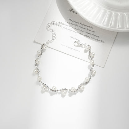 Conjunto de joyas de perlas y diamantes de imitación con temperamento de moda