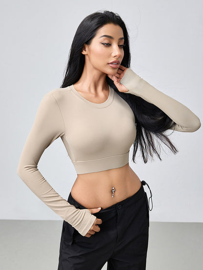 T-shirt de yoga moulant dos nu à manches longues et ajouré