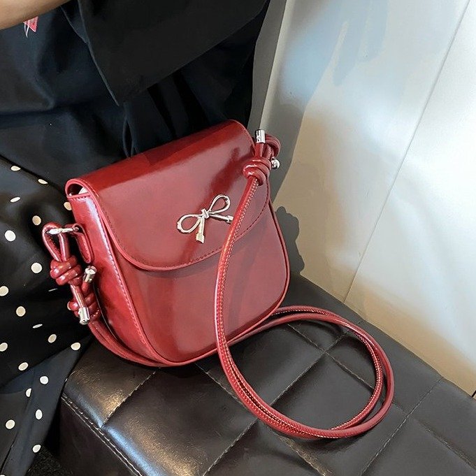 Mini bolso bandolera con lazo de color liso a la moda