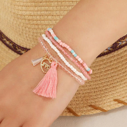 Pulsera de borla rosa con corazón de amor de aleación bohemia